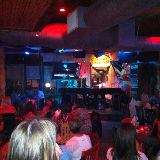 Photo taken at Rum Runners Dueling Piano Bar by Jenna K. on 10/9/2011
