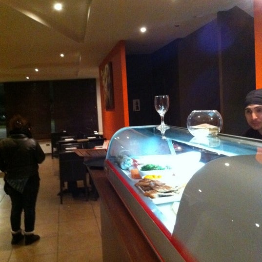 Photo taken at Oishi Sushi by Humberto Q. on 8/20/2011