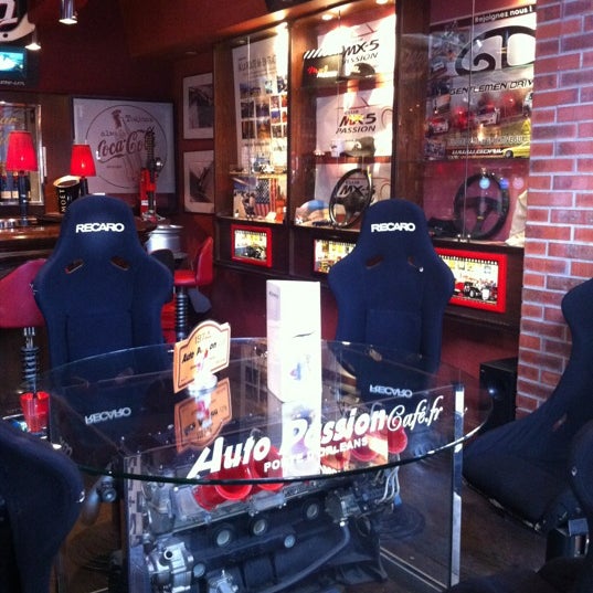 Photo taken at Auto Passion Café by Isabelle S. on 8/12/2012