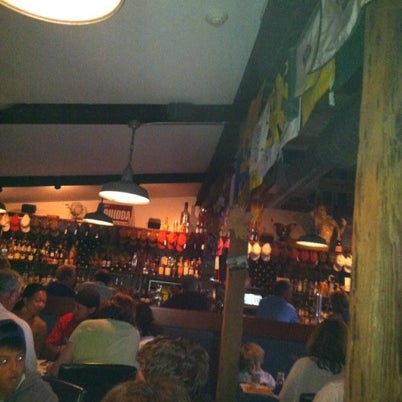 Photo taken at Joe&#39;s Beach Road Bar &amp; Grille at The Barley Neck Inn by Carlos N. on 7/24/2012