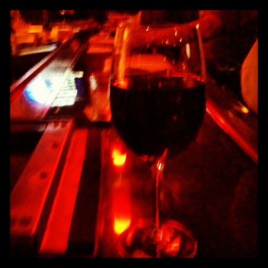 Photo taken at Nosh Wine Lounge by Sidnee L. on 6/1/2012