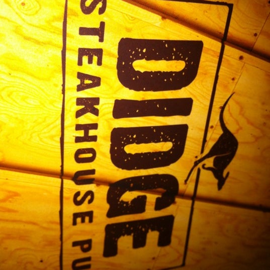 Foto tomada en Didge Steakhouse Pub  por Caio B. el 2/25/2012