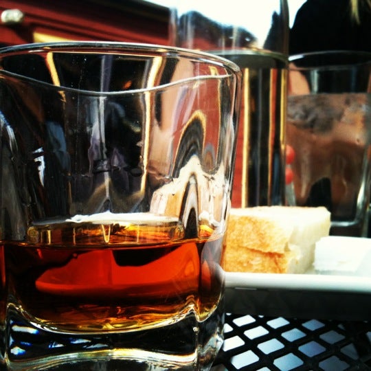 Photo taken at Flat Iron Grill by Nick B. on 6/21/2012