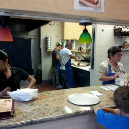 Photo taken at New York Pizzeria by Nancy C. on 6/14/2012