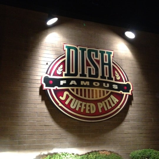 Photo taken at Dish Famous Stuffed Pizza by Martha R. on 3/14/2012