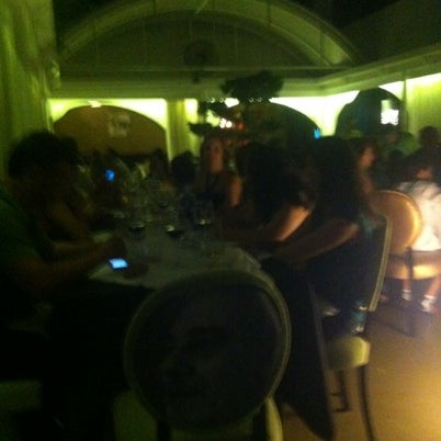 Photo taken at Nica Restaurante &amp; Lounge by Alex B. on 8/23/2012