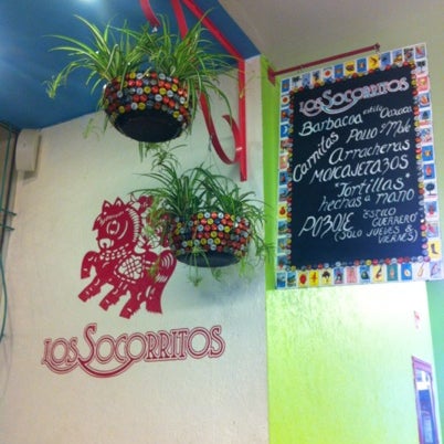 Photo taken at Los Socorritos by Ana C. on 9/2/2012