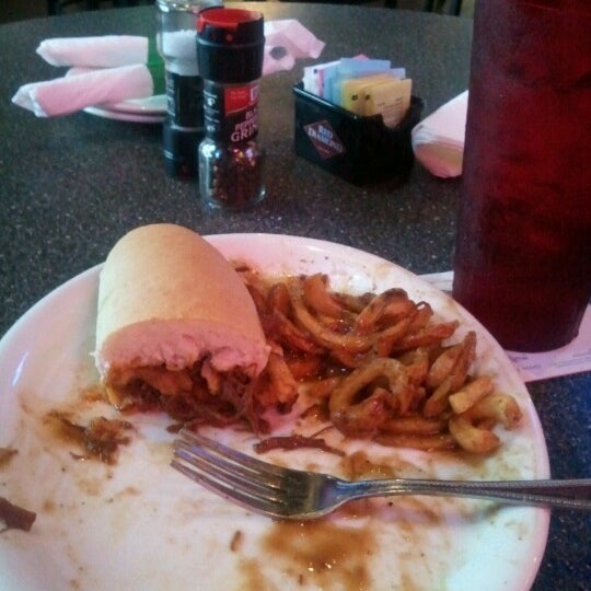 Photo taken at Baumhower&#39;s Wings by Terri G. on 6/11/2012