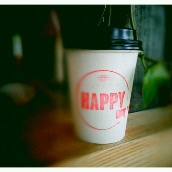 Photo taken at Happy Coffee by Jenna N. on 6/5/2012