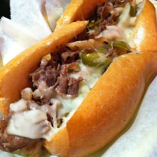 Photo taken at Busters Cheesesteak by Adam T. on 2/16/2012