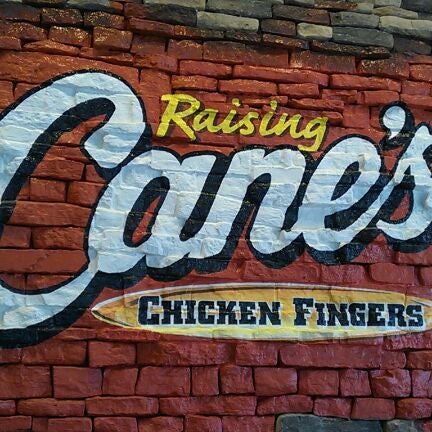 Photo taken at Raising Cane&#39;s Chicken Fingers by Sergio B. on 12/16/2011