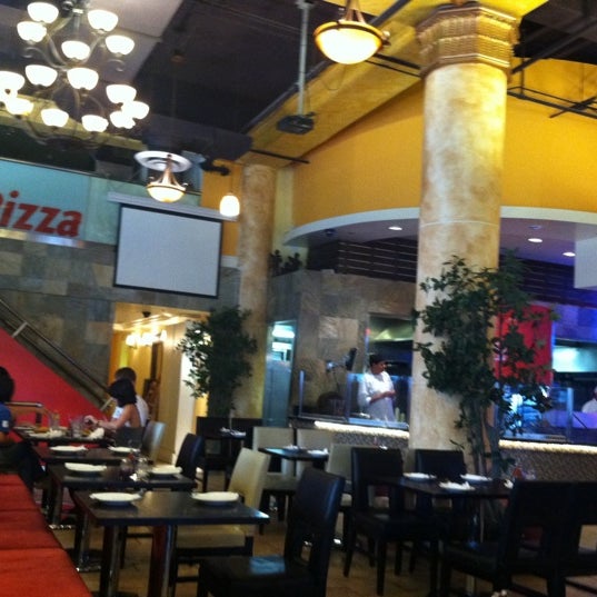 Photo taken at M Pizza by Cin on 9/21/2011