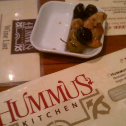 Photo taken at Hummus Kitchen by Charlie M. on 7/17/2012