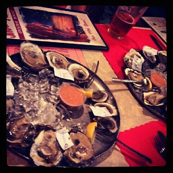 Photo taken at Snockey&#39;s Oyster &amp; Crab House by Jung K. on 8/21/2012