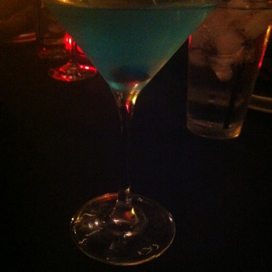 Photo taken at Downtown Main Martini Bar &amp; Grille by Shannon M. on 7/28/2012