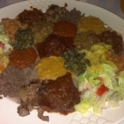 Photo taken at Messob Ethiopian Restaurant by Haili on 8/5/2012