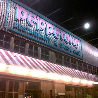 Photo taken at Pepperone Restaurant &amp; Sports Café by Giacomo A. on 10/29/2011