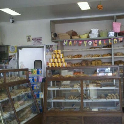 Photo taken at El Gallo Bakery by Kimberly S. on 10/9/2011