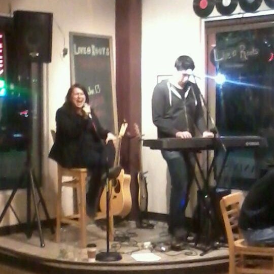 Photo taken at Roots Coffeehouse by Mark C. on 1/14/2012
