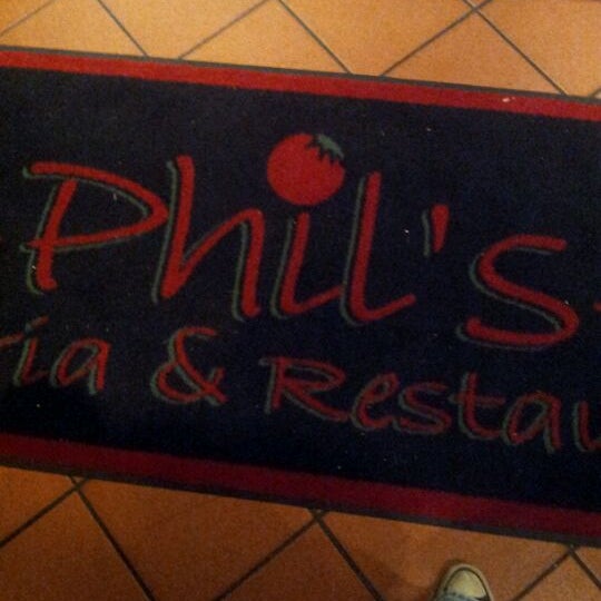 Photo taken at Phil&#39;s Pizzeria &amp; Restaurant by Pegster C. on 1/28/2012