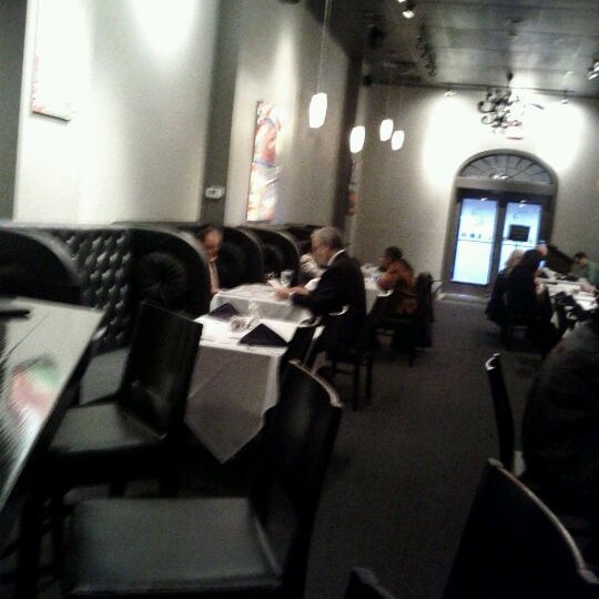 Photo taken at De&#39;Lish Cafe by Tanisha R. on 3/1/2012