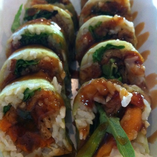 Photo taken at Rollbotto Sushi by Geneva A. on 1/16/2012