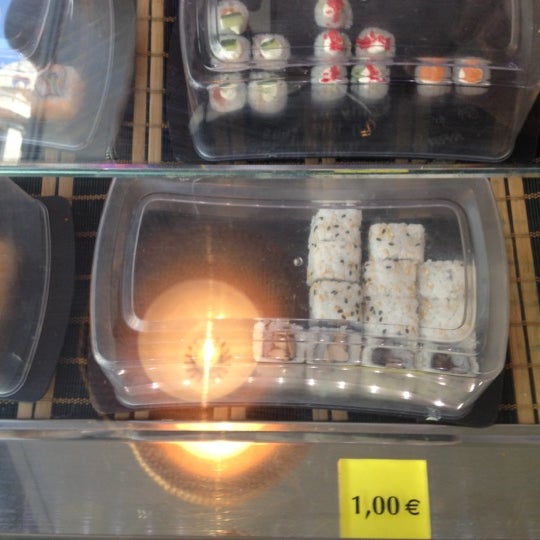 Photo taken at Sushi Store Express by Natalia on 7/11/2012