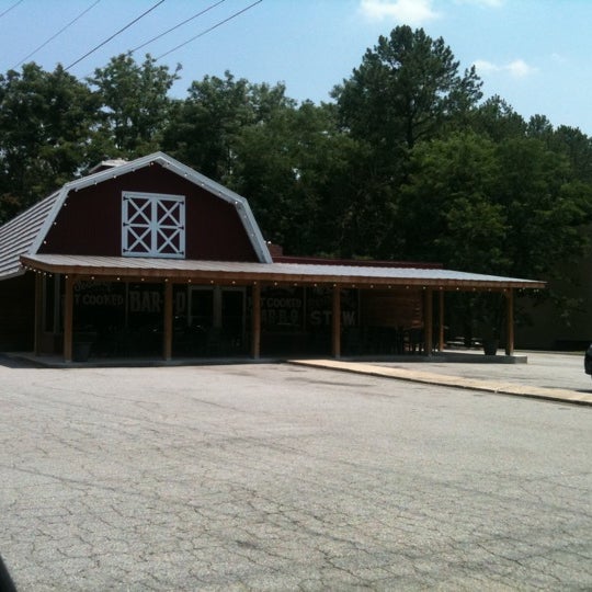 Photo taken at Old Brick Pit Barbecue by Drew B. on 6/10/2011