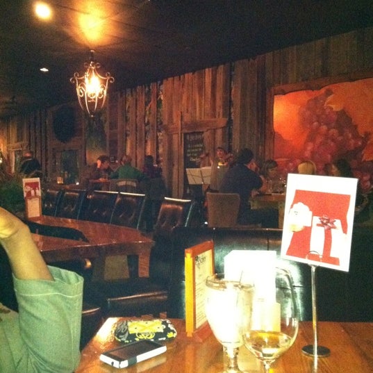 Photo taken at The Wooden Vine by Terrilin C. on 11/27/2011