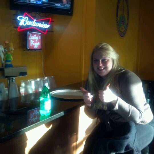 Photo taken at Zesty&#39;s Pizza by Lauren P. on 1/3/2012