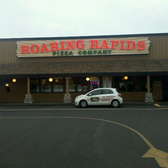Photo taken at Roaring Rapids Pizza Co. by Thomas P. on 3/7/2011