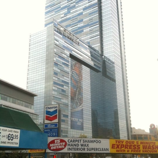 Odd juxtaposition.  I vote for a new hotel, sans car wash, which needs to move 5 blocks West.