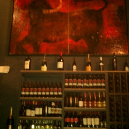 Photo taken at Left Coast Wine Bar by Gaston H. on 1/10/2012