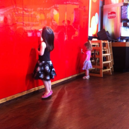 Photo taken at MOOYAH Burgers, Fries &amp; Shakes by Kevin R. on 4/13/2012