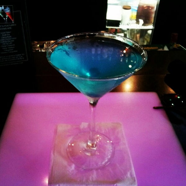 Photo taken at Downtown Main Martini Bar &amp; Grille by Brennan B. on 6/10/2012