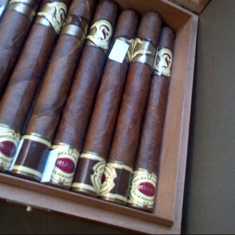 Photo taken at La Casa Del Tabaco Cigar Lounge by Brian H. on 6/28/2012