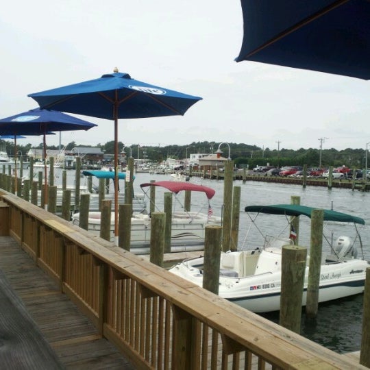Photo taken at Harborside Bar &amp; Grill by Geoff on 9/2/2012