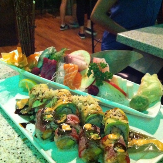 Photo taken at Mizu Japanese &amp; Thai Cuisine by Cindy W. on 5/26/2012