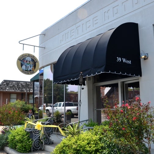 Here's our new sign and awning. Our hours are in big print on our front door. Mon - Thurs 11 am - 9 pm. Fri - Sat 11 am - 11 pm. Live music Thurs at 6:30; Fri - Sat at 8:00 for 2 hours.