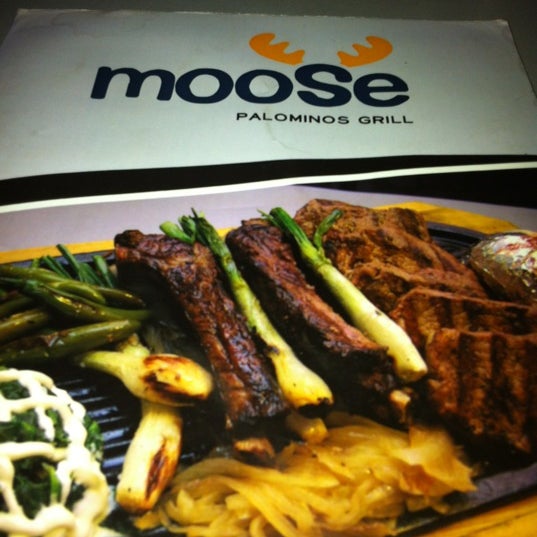Photo taken at Moose Palominos Grill by Kino S. on 5/23/2012
