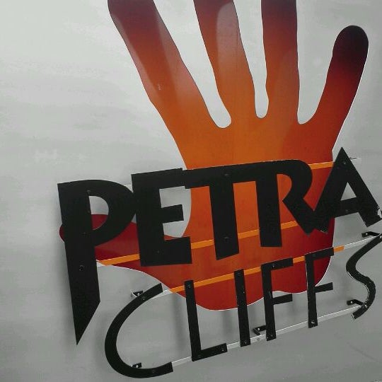 Photo taken at Petra Cliffs Climbing Center &amp; Mountaineering School by Ryan E. on 4/22/2012