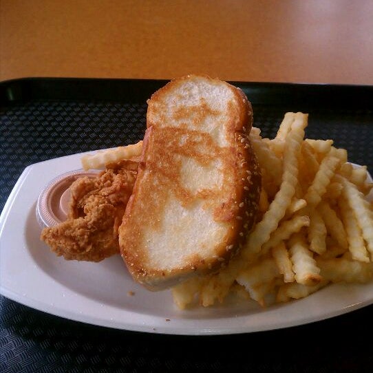 Photo taken at Raising Cane&#39;s Chicken Fingers by Kirk S. on 1/7/2012