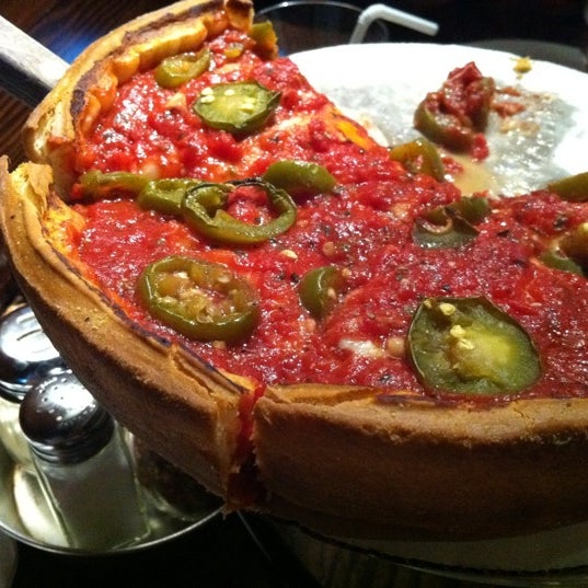 Photo taken at Patxi’s Pizza by Julius S. on 4/15/2011
