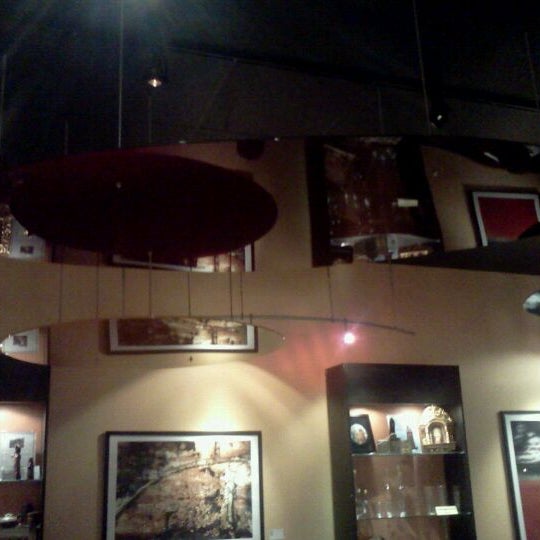 Photo taken at Rico&#39;s Cafe &amp; Wine Bar by Jacob K. on 1/3/2012