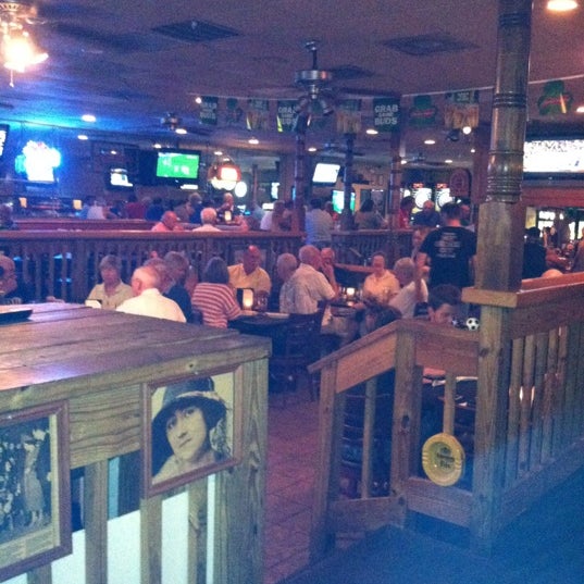 Photo taken at Mike &amp; Lisa&#39;s Cricketers British Pub &amp; Restaurant by Angela G. on 3/21/2012