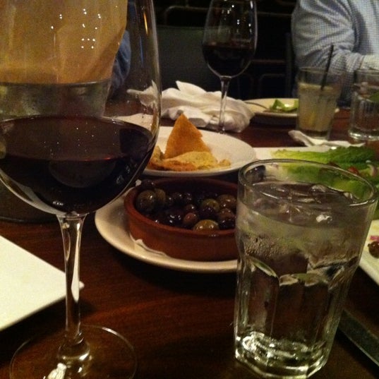 Photo taken at Barcelona Restaurant &amp; Wine Bar by Megan B. on 5/29/2012