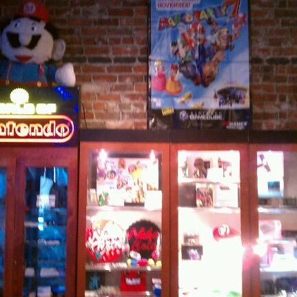 Photo taken at Bits &amp; Pixels Video Game Store by Nikki G. on 2/1/2012