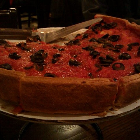 Photo taken at Patxi&#39;s Pizza by Kristina O. on 1/4/2012