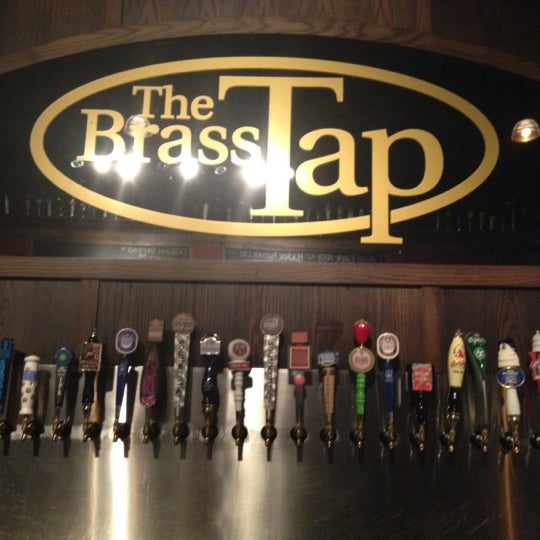 Photo taken at The Brass Tap by Dom D. on 7/18/2012
