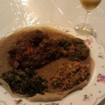 Photo taken at Aster&#39;s Ethiopian Restaurant by Amber L. on 2/20/2012